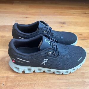 On Running Women’s Black Sneakers with Frost Blue Soles Gray